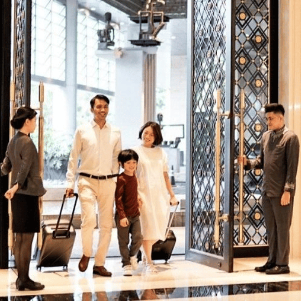 Family settling comfortably inside thoughtfully designed hotel room | Magickworld